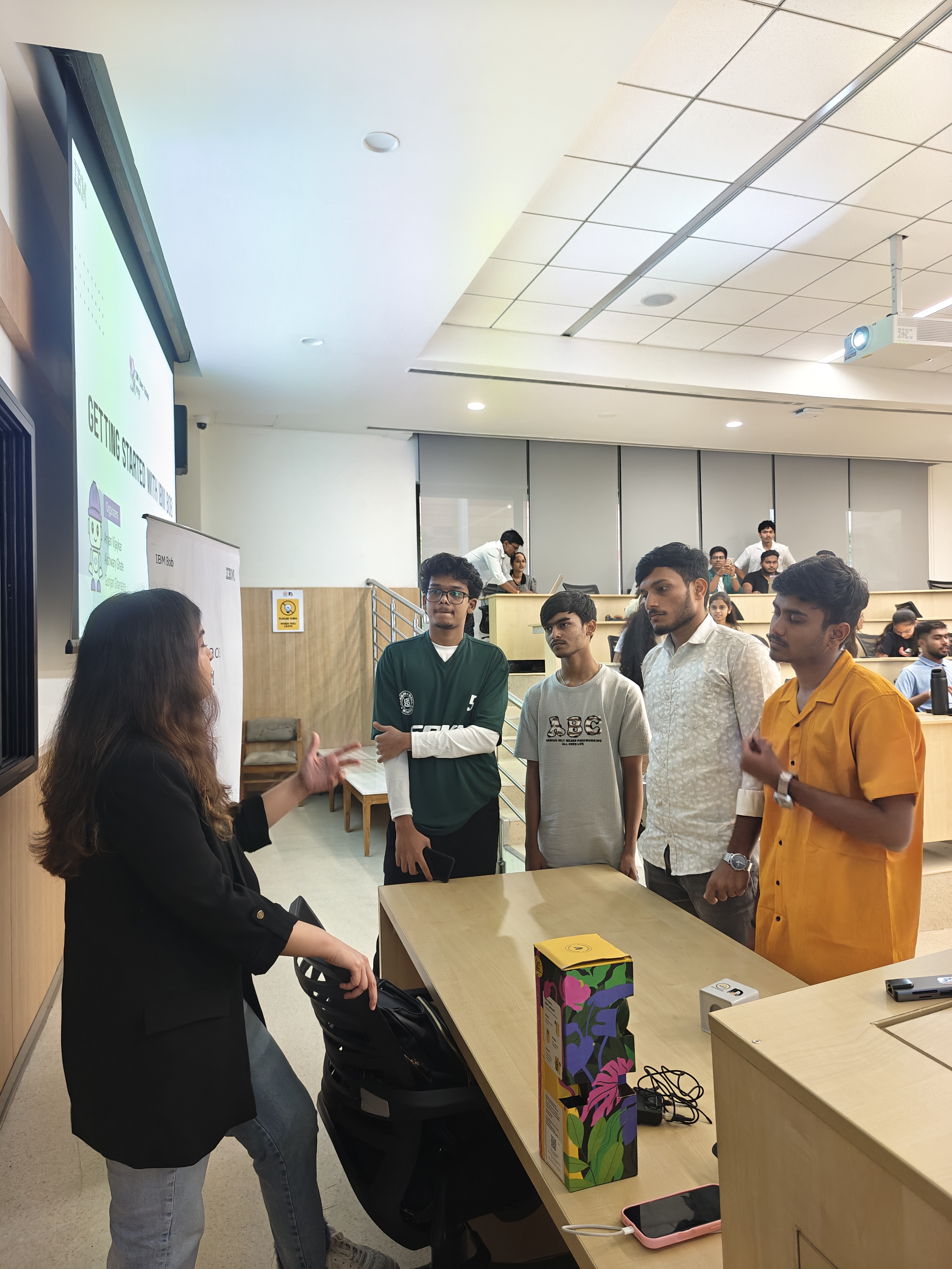 Members talking at an IBM User Group meetup.